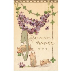 COCHONS -MK52846 BONNE ANNEE TROIS COCHONS FLEURS VIOLETTE CIRQUE DORURE GAUFREE