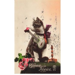CHATS -MK40079 BONNE ANNEE CHAT NOEUD PAPILLON GUITARE