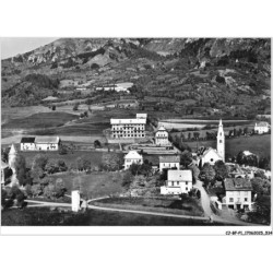 CJ-BFP1-0268-05 - En avion au-dessus de - SAINT-JEAN SAINT-NICOLAS - L'église et le centre d'apprentissage