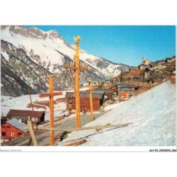 ALYP2-0134-05 - SAINT-VERAN - Vue d'hiver avec le grand calvaire sculpté en bois de mélèze