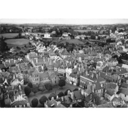 15 MAURIAC AA-DC026 VUE AERIENNE PLACE DE L EGLISE ET SES ALENTOURS BOISES