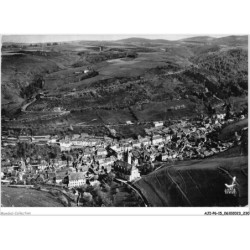 AJIP6-15-0667 - en avion au-dessus de - CHAUDES-AIGUES - cantal - vue générale et route de st-chély d'apcher