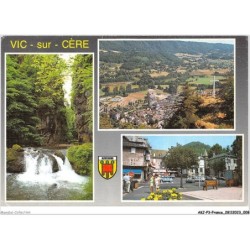 AKJP3-0217-15 - VIC-SUR-CERE - le pas de cere - la place de la mairie - vue générale de la ville